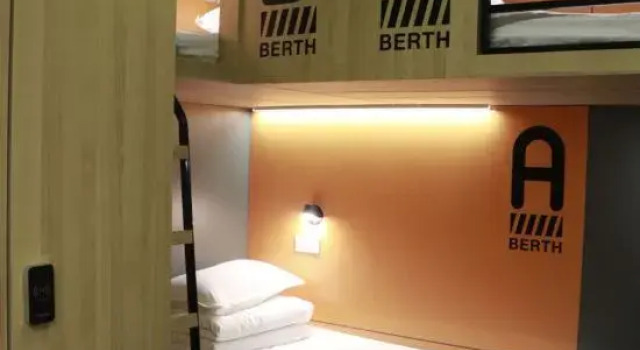 Кровать в общем номере (мужской номер) wohkoon zhexingsun youth hotel(Beijing Ditan Park Anzhen Hospital)