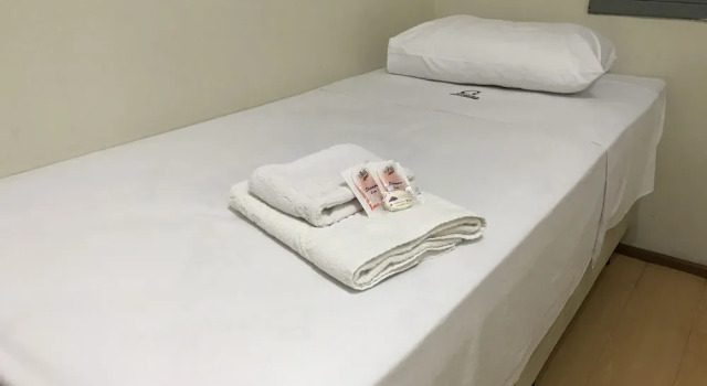 Кровать в общем номере Hotel São Lourenço