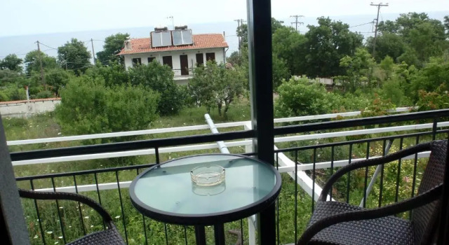 Студия с видом на море Petroudas Apartments