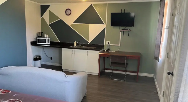Четырёхместные семейные апартаменты Stop 21 Motel