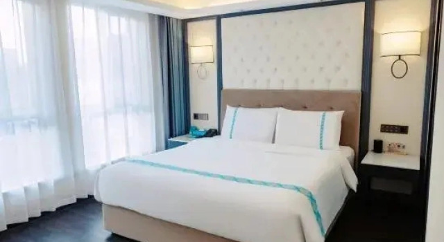 Двухместный люкс Deluxe Xana Hotelle Hotel (Mudanjiang Jiangnan Municipal Government)