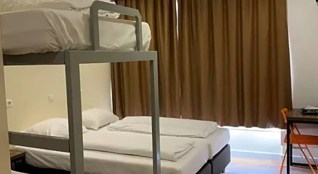 Четырёхместный номер Budget Dam Hotel
