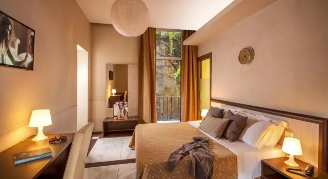 Standard- firedobbelt værelse med altan Corso Grand Suite