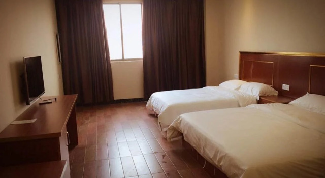 Q+ Nanxiong Xinhewan Business Hotel, Boek Hotel Shaoguan Guangdong