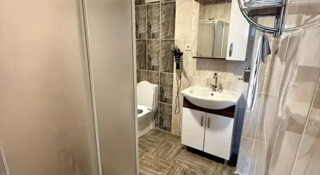 Кровать в общем номере otel sema