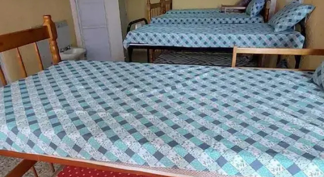 Кровать в общем номере Hostel Bom e Familiar