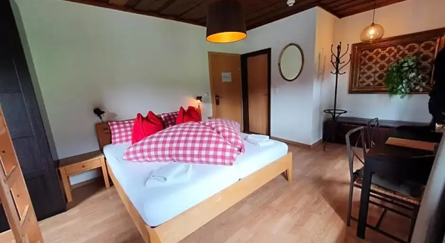 Четырёхместный номер Deluxe Boutique Hotel Alpenhof