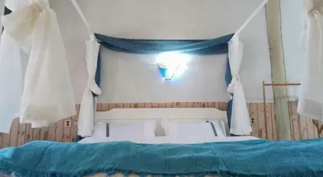 Quanningyue Inn, Rezerwuj Hotel Hotele w Lijiang z basenem, w pobliżu Sifang Tingyin Square, Basen
