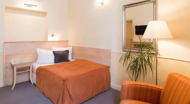 O podwyższonym standardzie jednoosobowy pokój Unitas Hotel