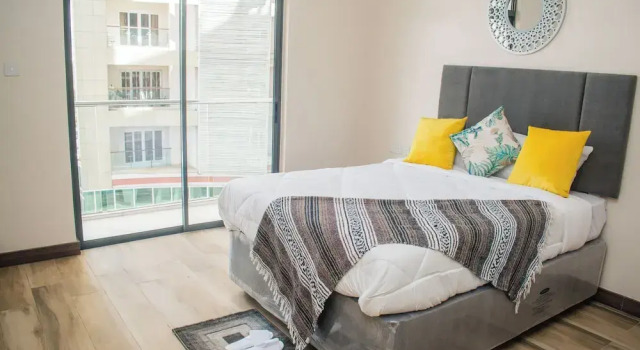 Апартаменты SILVERSTONE APARTMENTS -Modern Living 1 BR NEAR YAYA - GYM&POOL