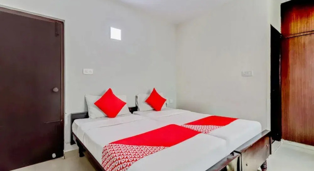 Oyo 1231 Roxel Inn, Забронировать Отель Отели Бангалора с парковкой, рядом с Больница Манипал, Парковка