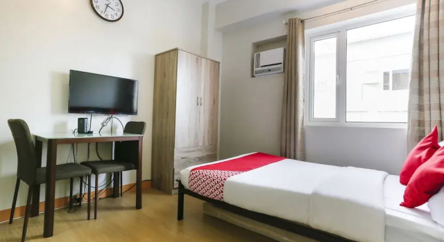 OYO 467 Trees Residences, Забронировать Отель Кесон-Сити 