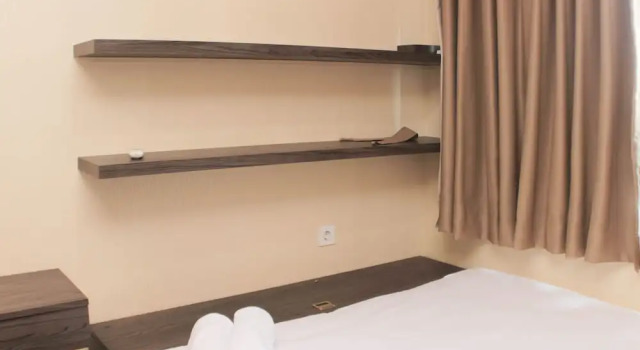 Апартаменты Nice and Comfort 1BR at Sky Terrace Apartment By Travelio