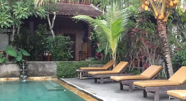 Двухместный номер Deluxe с балконом и с красивым видом из окна Dewa Bungalows, A Balinese House and Art Gallery