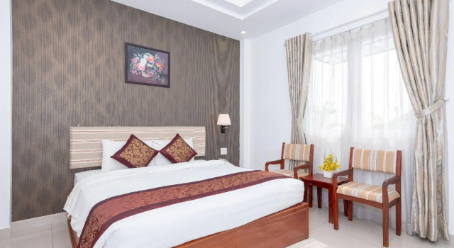 Двухместный номер Deluxe Airport Saigon Hotel - Gần ẩm thực đêm chợ Phạm Văn Hai