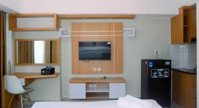 New Furnsihed Studio Room Apartment at Springlake Bekasi By Travelio