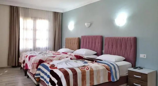 Luksusowy trzyosobowy pokój Sezgin Boutique Hotel