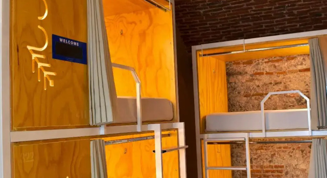 Кровать в общем номере Casa Pepe
