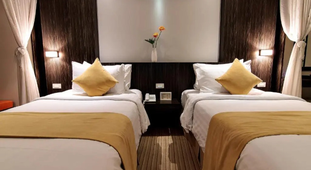 Четырёхместный семейный номер Standard Bossotel Bangkok