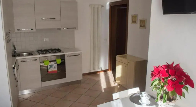 Апартаменты la terrazza del borgo con parcheggio