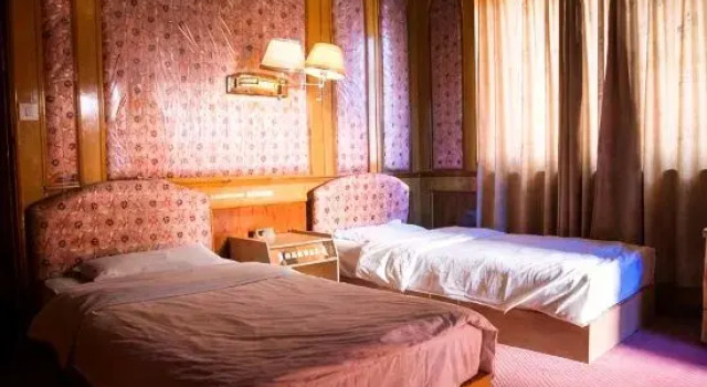 Четырёхместный люкс Shiping Jixiang Hotel