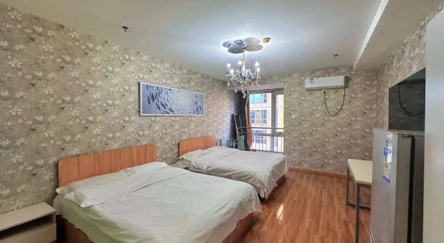 Четырёхместный номер Comfort Tiandi Huadian Apartment Youlehui