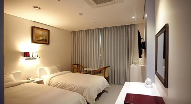 Номер Deluxe Dong Seoul Hotel