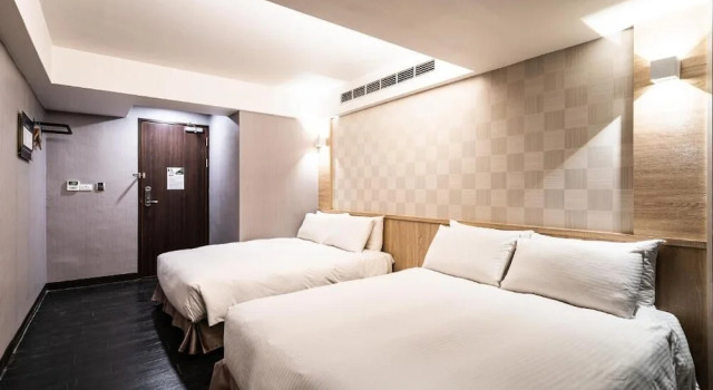 Номер Deluxe Global Traveler Hotel