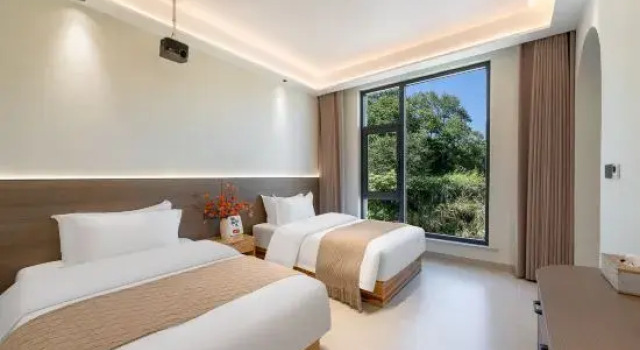 Семейный люкс с 2 комнатами MoxiCourtyard Villa;AccommodationforLeisure andVacationwithMountainViews(WuyuanHualiScenicAreaStore)