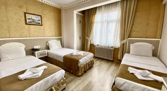 Трёхместный номер Grand Oral Hotel