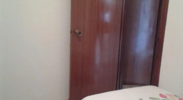 Апартаменты с 3 комнатами с балконом Apartamento Turístico