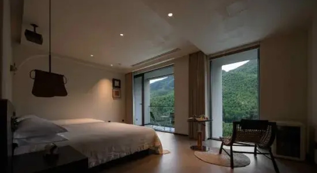 Кровать в общем номере с 3 комнатами Shanyueji MOONHILL Design Guesthouse