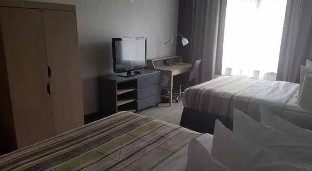 Четырёхместный номер Standard Country Inn & Suites by Radisson, Washington, DC East - Capitol Heights, MD
