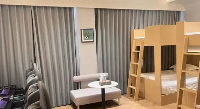 Кровать в общем номере Nanxi Hotel (Jinbaihui Times Square Store, Nanjie Village)