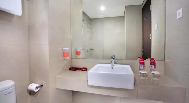 Номер Deluxe dprimahotel Panakkukang Makassar