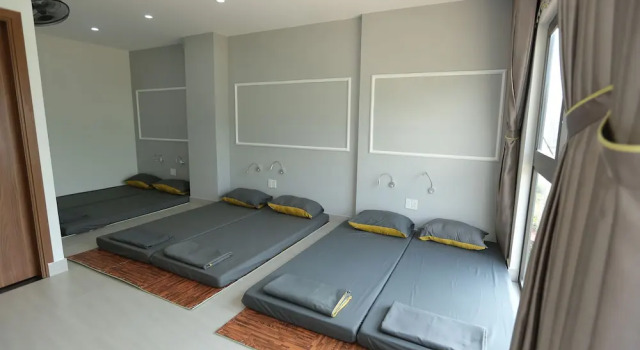 Кровать в общем номере Ha Giang Hostel