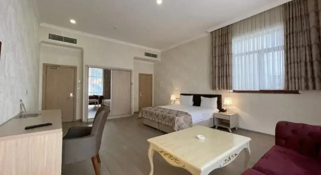 Номер Deluxe Ammar Grand Hotel