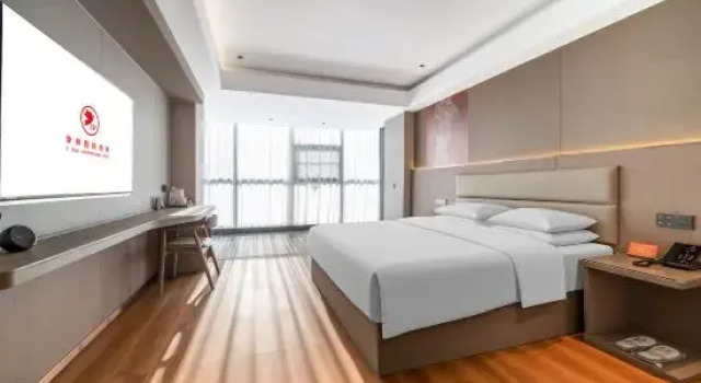 Люкс Deluxe Jifeng International Hotel (Xinyang New 16th Street Branch)