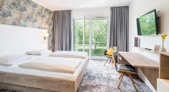 Номер Standard Stadthotel Lohne, Self Check-in & entspannt im Café frühstücken