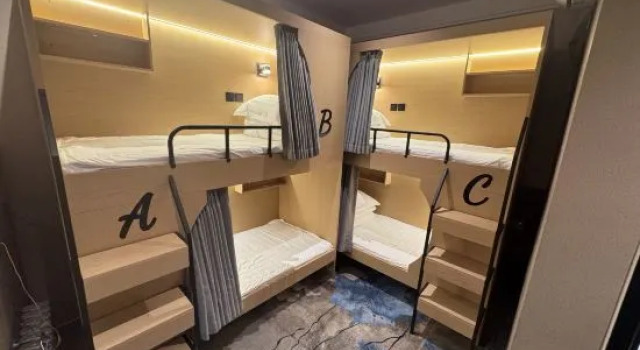 Кровать в общем номере (мужской номер) Lanxi Business Hotel Beijing (Wangjing Soho Wangjing subway station)