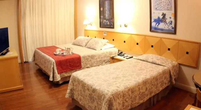 Четырёхместный номер Deluxe Village Hotel