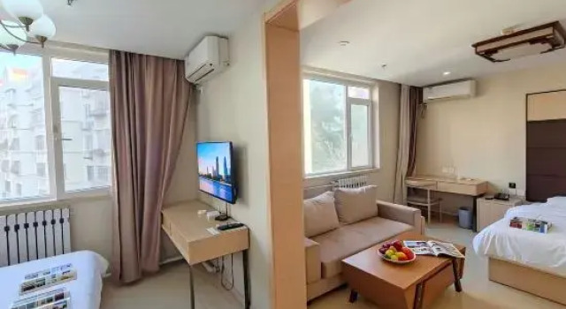 Полулюкс Qingdao Jinshancheng Business Hotel (Qingdao North Station Shuiqinggou Subway Station)