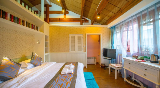 Orchid Land Boutique Inn, Забронировать Курортный отель Лицзян Юньнань, рядом с Улица Сквер-стрит Древнего города Даянь