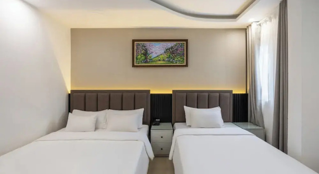 Трёхместный семейный номер Standard A25 Premium Hotel - 65G Nguyen Thai Hoc