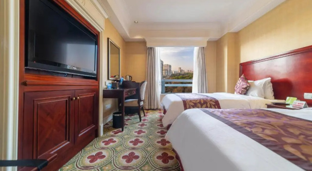 Номер Deluxe Ramada Yichang Hotel