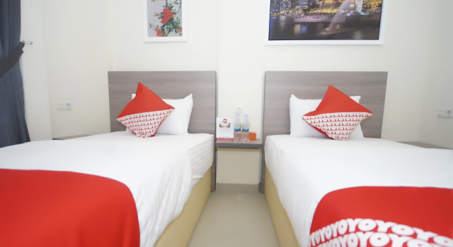 OYO 251 The Maximus Inn Hotel, Rezerwuj Hotel Palembang Sumatra