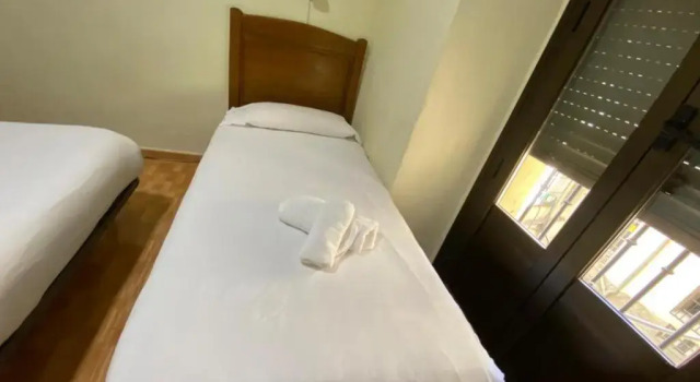 Трёхместный номер Hostal Los Perales