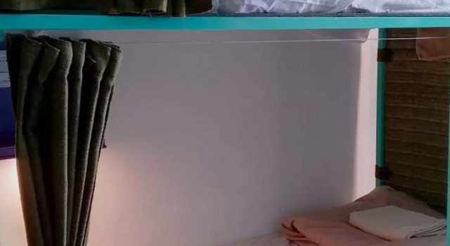 Кровать в общем номере Youki Haus Hostel