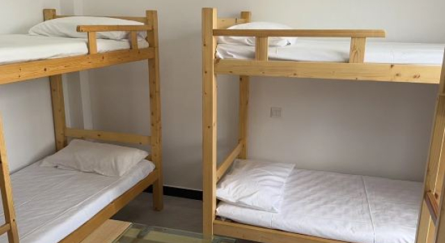 Кровать в общем номере (женский номер) Mingxing Hotel