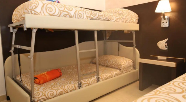 Кровать в общем номере Miramare Scilla GYH Luxury